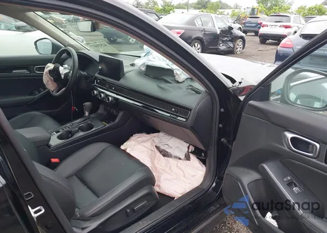 2024 Honda Civic Touring z USA, uszkodzony, nr VIN 2HGFE1F90RH333297